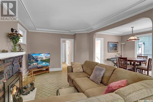 2345 Elphinstone Street, Regina, SK - Indoor Photo Showing Living Room With Fireplace