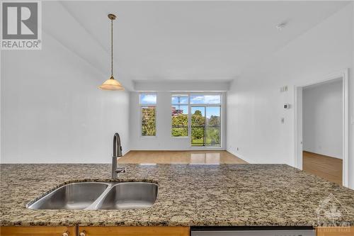 205 Bolton Street Unit#413, Ottawa, ON - Indoor Photo Showing Kitchen With Double Sink