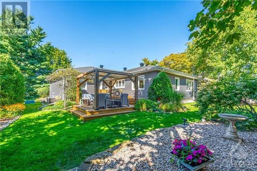 Landscaped Back Yard - 162 Heath Street, Ottawa, ON - Outdoor With Deck Patio Veranda