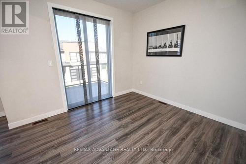 doors from living room to balcony - 996 West Village Square, London, ON 