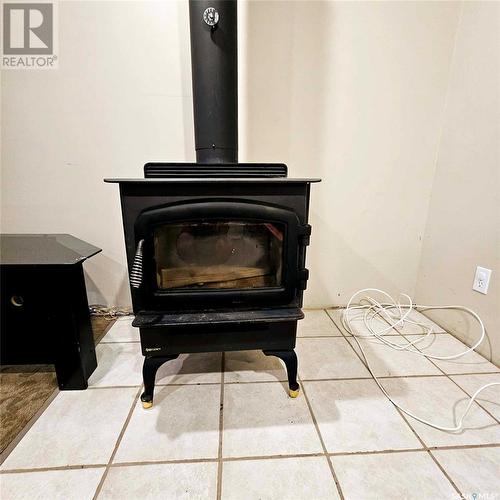 1117 Asquith Drive, Esterhazy, SK - Indoor Photo Showing Living Room With Fireplace