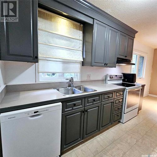 1117 Asquith Drive, Esterhazy, SK - Indoor Photo Showing Kitchen With Double Sink