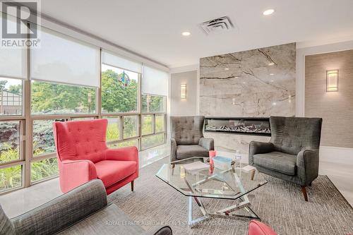 503 - 5090 Pinedale Avenue, Burlington, ON - Indoor Photo Showing Living Room With Fireplace