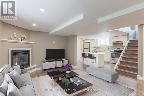 18 Denniston Street, Kawartha Lakes (Lindsay), ON - Indoor Photo Showing Living Room With Fireplace