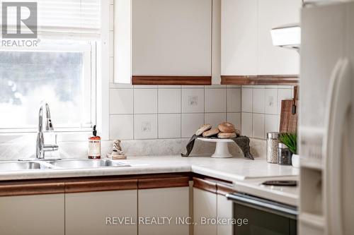 18 Denniston Street, Kawartha Lakes (Lindsay), ON - Indoor Photo Showing Kitchen With Double Sink