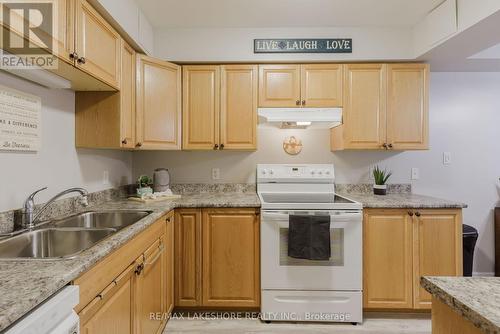 109 - 841 Battell Court, Cobourg, ON - Indoor Photo Showing Kitchen With Double Sink