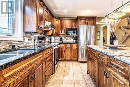 929 Eldon Road, Kawartha Lakes (Oakwood), ON - Indoor Photo Showing Kitchen With Double Sink