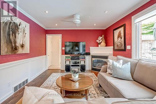 3159 South Drive, Burlington, ON - Indoor Photo Showing Living Room With Fireplace