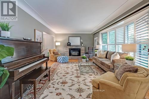 3159 South Drive, Burlington, ON - Indoor Photo Showing Living Room With Fireplace