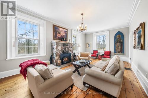 7243 Concession 1, Puslinch, ON - Indoor Photo Showing Living Room With Fireplace