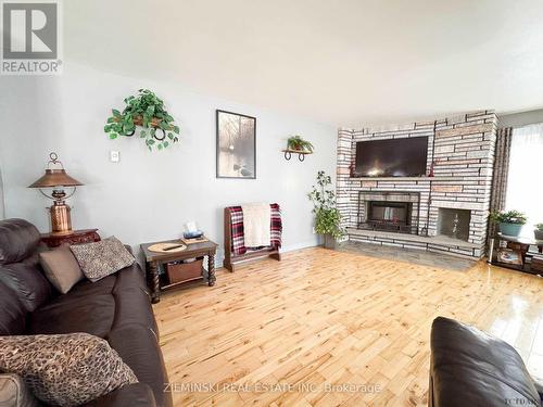 367 Timmins Avenue, Black River-Matheson, ON - Indoor Photo Showing Living Room With Fireplace