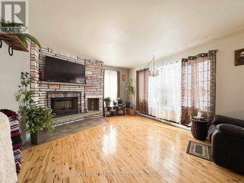 367 Timmins Avenue, Black River-Matheson, ON - Indoor Photo Showing Living Room With Fireplace