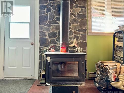 188 Bellevue Street, Edmundston, NB - Indoor With Fireplace