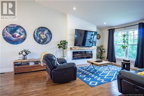 180 Country Wood Lane, Richibucto Road, NB - Indoor Photo Showing Living Room With Fireplace