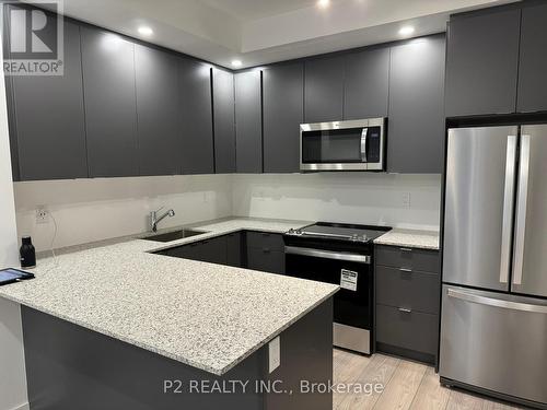 143 - 15 Lytham Green Circle, Newmarket, ON - Indoor Photo Showing Kitchen With Stainless Steel Kitchen With Upgraded Kitchen