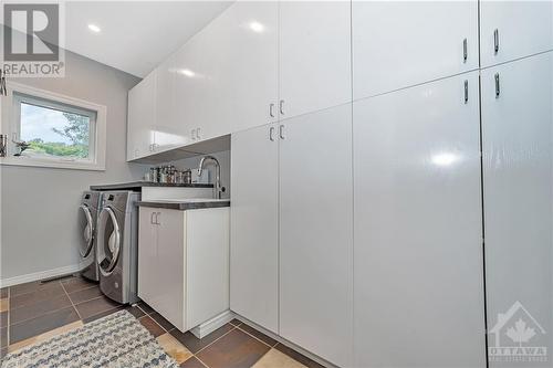 1198 Fieldown Street, Cumberland, ON - Indoor Photo Showing Laundry Room