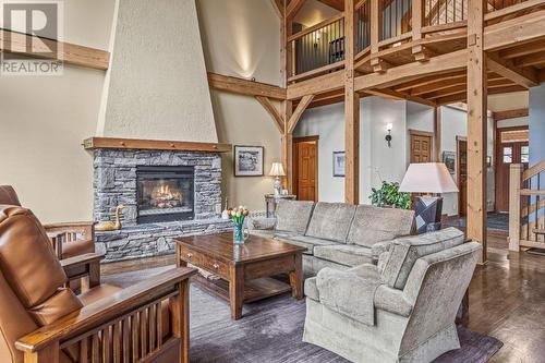 1403 Deer Ridge Road, Golden, BC - Indoor Photo Showing Living Room With Fireplace