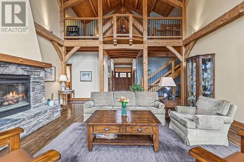 1403 Deer Ridge Road, Golden, BC - Indoor Photo Showing Living Room With Fireplace