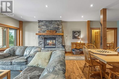 1403 Deer Ridge Road, Golden, BC - Indoor Photo Showing Living Room With Fireplace