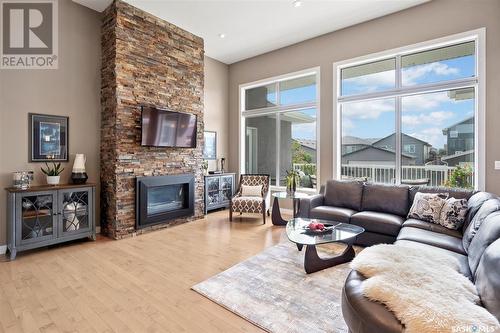 115 Johns Road, Saskatoon, SK - Indoor Photo Showing Living Room With Fireplace