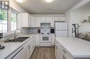 6061 Birchwood Crescent, Prince George, BC  - Indoor Photo Showing Kitchen With Double Sink 