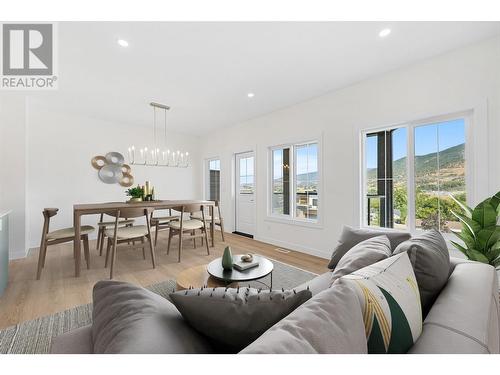 353 Arrowleaf Rise, Coldstream, BC - Indoor Photo Showing Living Room