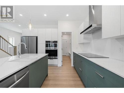 353 Arrowleaf Rise, Coldstream, BC - Indoor Photo Showing Kitchen With Double Sink With Upgraded Kitchen