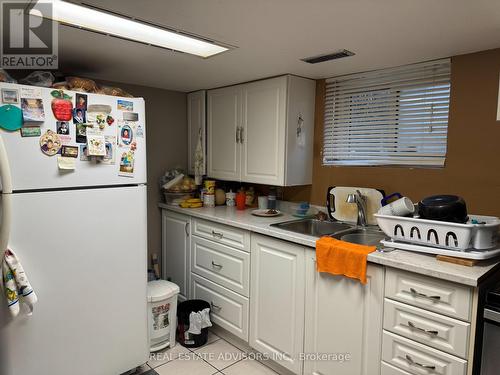 38 Twenty Second Street, Toronto (Long Branch), ON - Indoor Photo Showing Kitchen With Double Sink