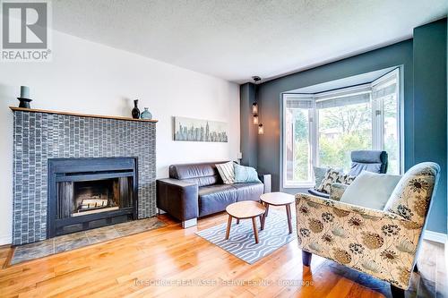 1552 Bourcier Drive, Ottawa (Cumberland), ON - Indoor Photo Showing Living Room With Fireplace