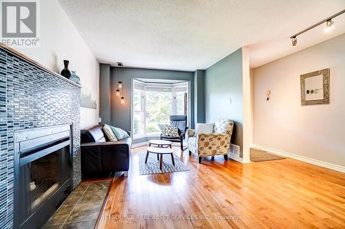 1552 Bourcier Drive, Ottawa (Cumberland), ON - Indoor Photo Showing Living Room With Fireplace