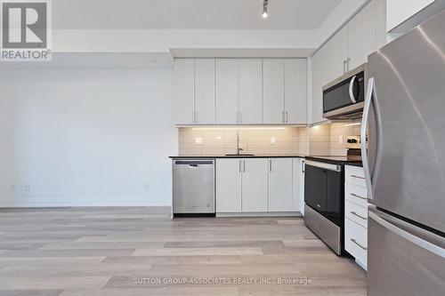 320 - 3121 Sheppard Avenue E, Toronto (Tam O'Shanter-Sullivan), ON - Indoor Photo Showing Kitchen With Stainless Steel Kitchen