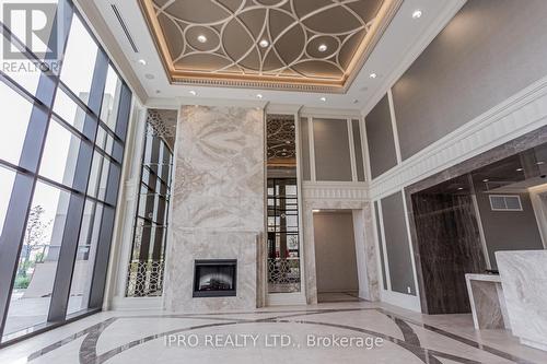 809 - 9075 Jane Street, Vaughan, ON - Indoor Photo Showing Other Room With Fireplace