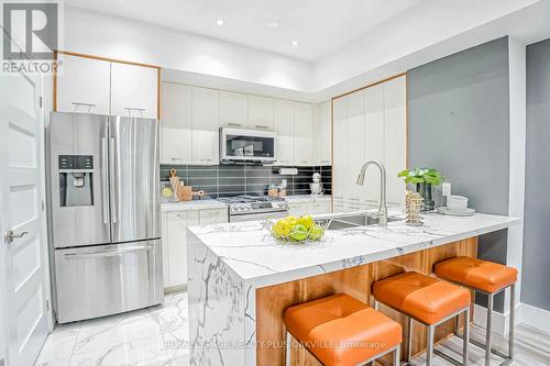 28 - 19 Valhalla Inn Road, Toronto (Islington-City Centre West), ON - Indoor Photo Showing Kitchen With Stainless Steel Kitchen With Upgraded Kitchen