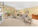 945 Lawrence Avenue Unit# 104, Kelowna, BC  - Indoor Photo Showing Living Room With Fireplace 