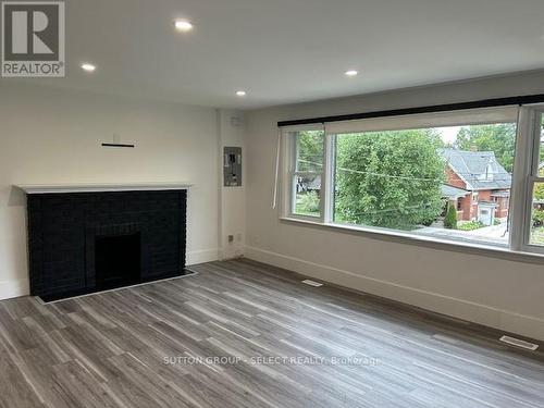 1 - 35 Tecumseh Avenue E, London, ON - Indoor Photo Showing Living Room With Fireplace