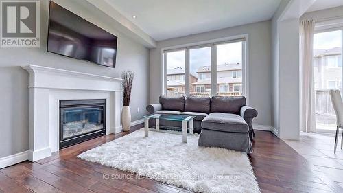 291 Leiterman Drive, Milton (Ford), ON - Indoor Photo Showing Living Room With Fireplace