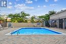 Th#111 - 220 Forum Drive, Mississauga, ON  - Outdoor With In Ground Pool With Backyard 