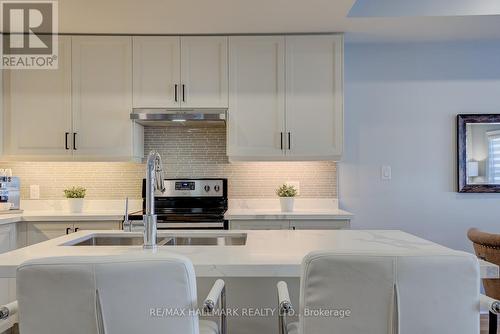 231 - 3905 Major Mackenzie Drive, Vaughan (Vellore Village), ON - Indoor Photo Showing Kitchen With Double Sink With Upgraded Kitchen