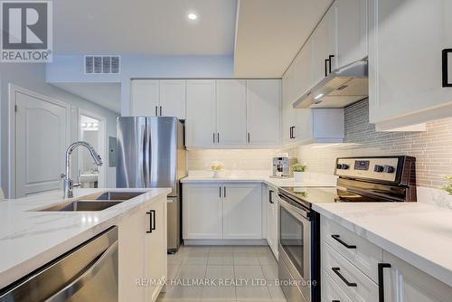 231 - 3905 Major Mackenzie Drive, Vaughan, ON - Indoor Photo Showing Kitchen With Double Sink With Upgraded Kitchen