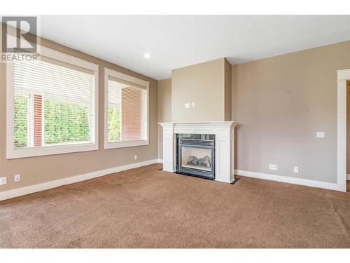 1102 Hume Avenue, Kelowna, BC - Indoor Photo Showing Other Room With Fireplace