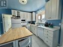 243 20Th Street E, Prince Albert, SK  - Indoor Photo Showing Kitchen With Double Sink 