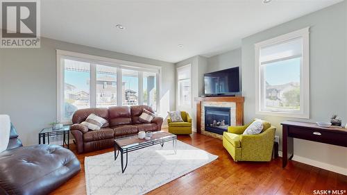 5102 Devine Drive, Regina, SK - Indoor Photo Showing Living Room With Fireplace