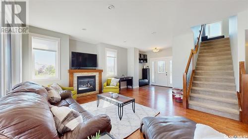 5102 Devine Drive, Regina, SK - Indoor Photo Showing Living Room With Fireplace