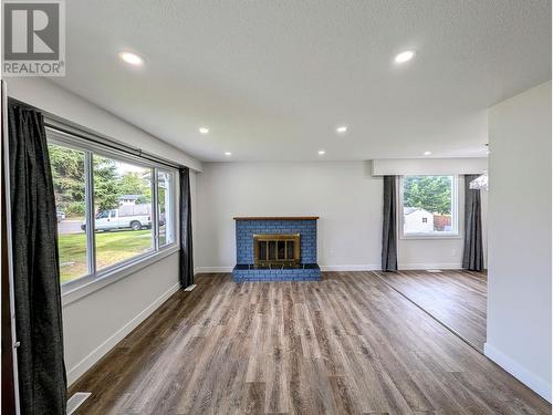 6160 Trent Drive, Prince George, BC - Indoor Photo Showing Living Room With Fireplace