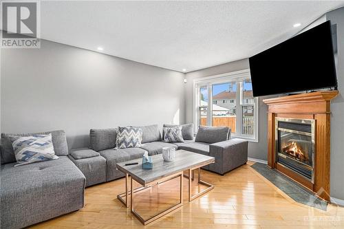 544 Chardonnay Drive, Ottawa, ON - Indoor Photo Showing Living Room With Fireplace