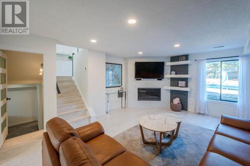 9504 Hummingbird Lane, Osoyoos, BC - Indoor Photo Showing Living Room With Fireplace