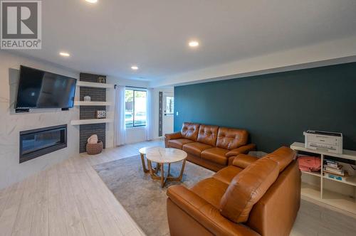 9504 Hummingbird Lane, Osoyoos, BC - Indoor Photo Showing Living Room With Fireplace