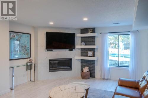 9504 Hummingbird Lane, Osoyoos, BC - Indoor Photo Showing Living Room With Fireplace