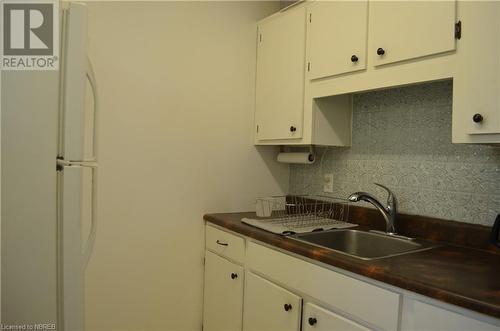 448 Main Street Unit# A,B,C & 448, Powassan, ON - Indoor Photo Showing Kitchen