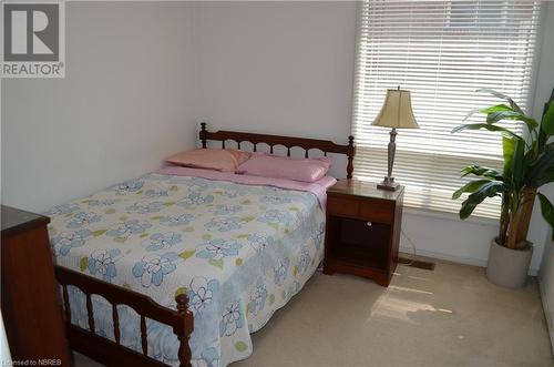 448 Main Street Unit# A,B,C & 448, Powassan, ON - Indoor Photo Showing Bedroom